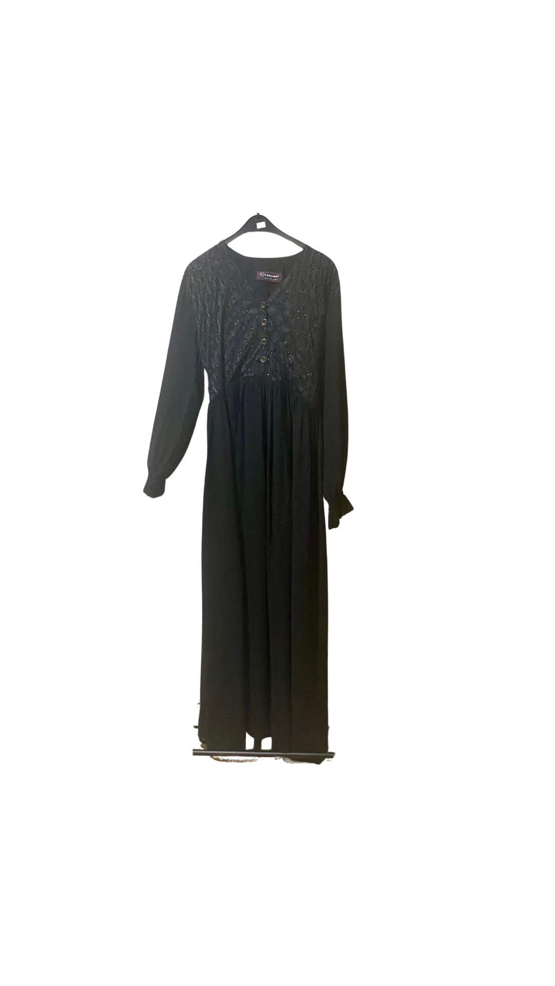 Black Abaya with design on front.